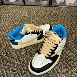 Women’s Black and Blue Sneakers. “fake” Travis scott’s